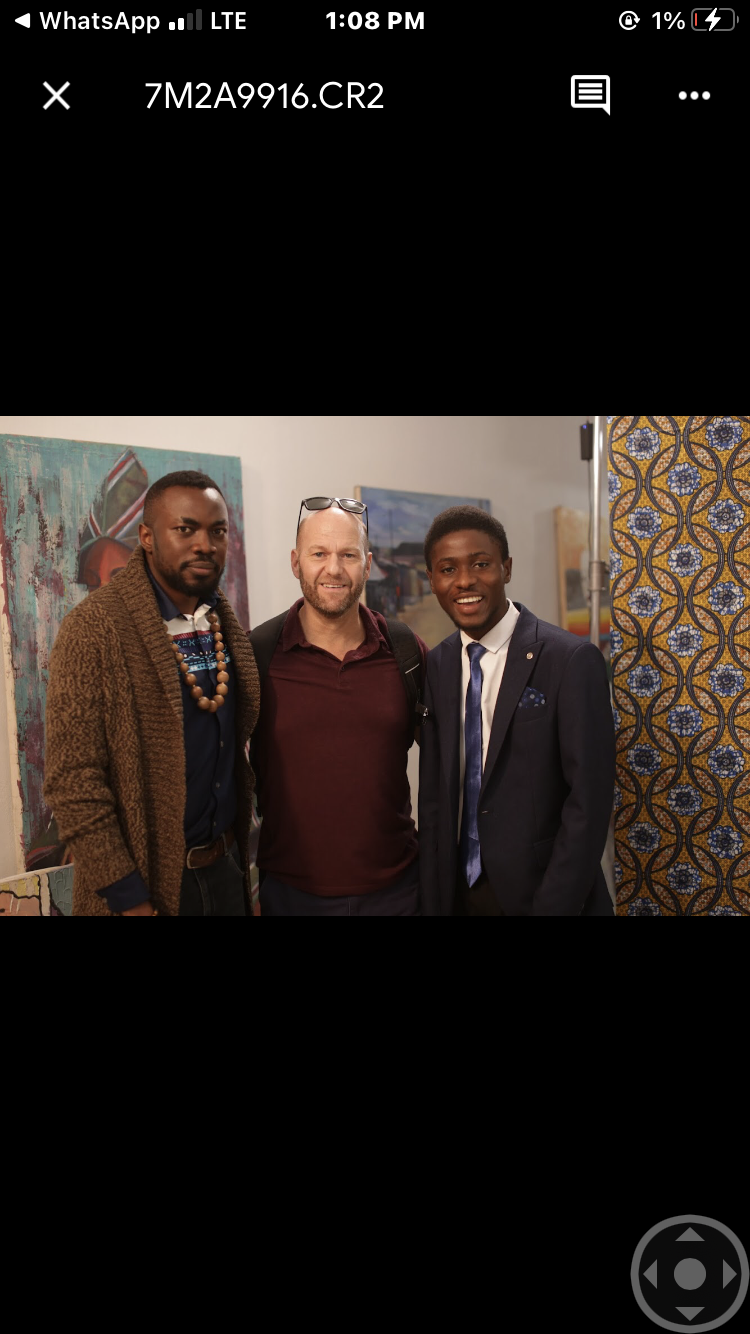 Networking with industry guests at an art gallery event